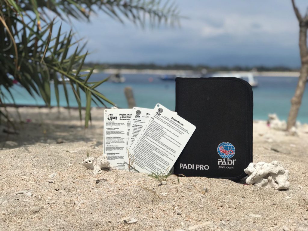 PADI instructor manual and waterproof slates