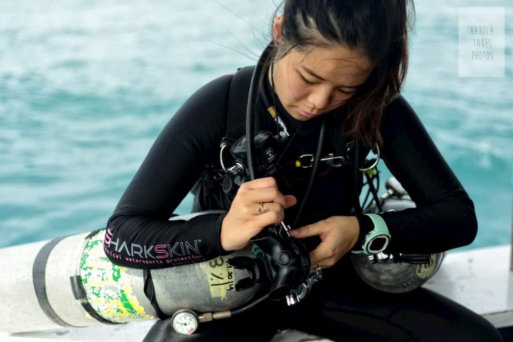 Sidemount Diver gearing up for a dive